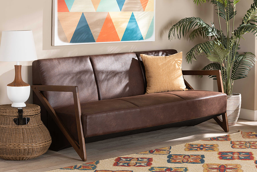 Baxton Studio Christa Mid-Century Modern Transitional Dark Brown Faux Leather Effect Fabric Upholstered and Walnut Brown Finished Wood Sofa